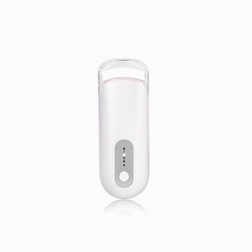 Electric heated eyelash curler with comb