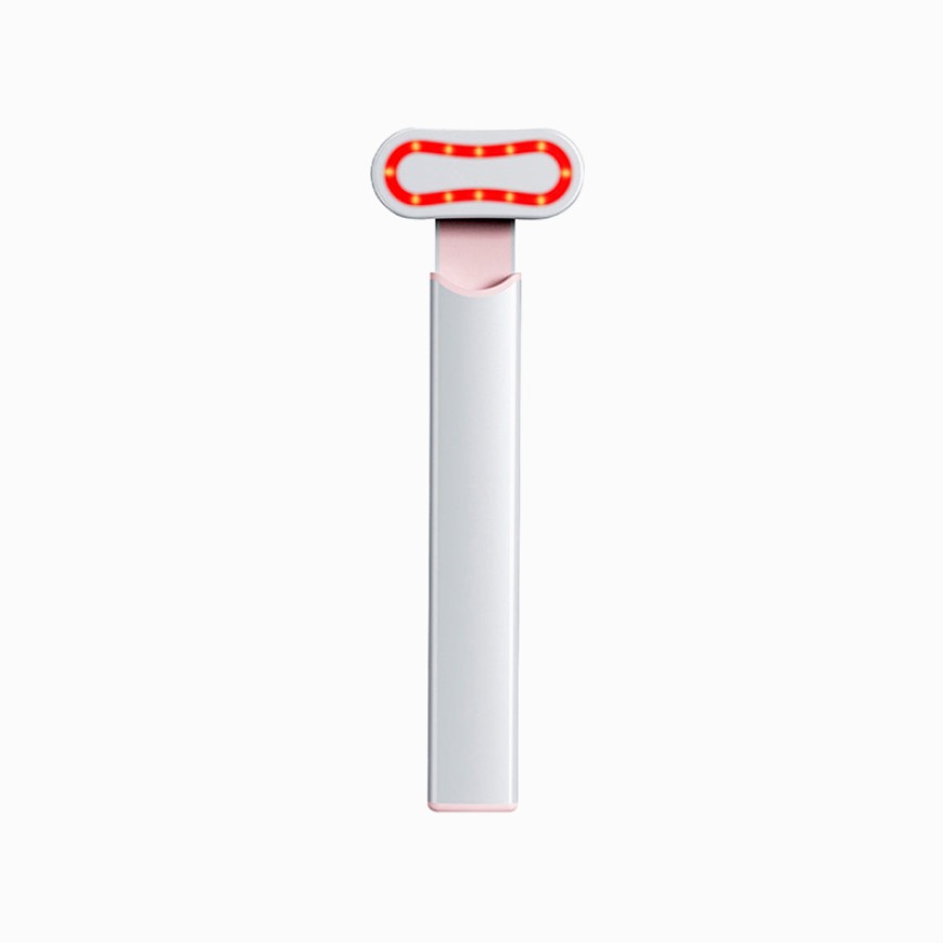Rotating heated eye revitalizing massage stick