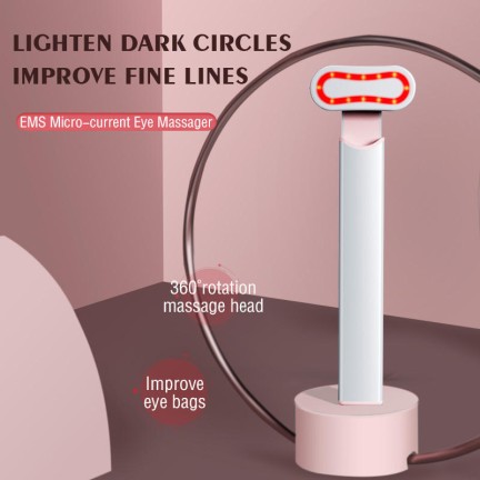 Rotating heated eye revitalizing massage stick